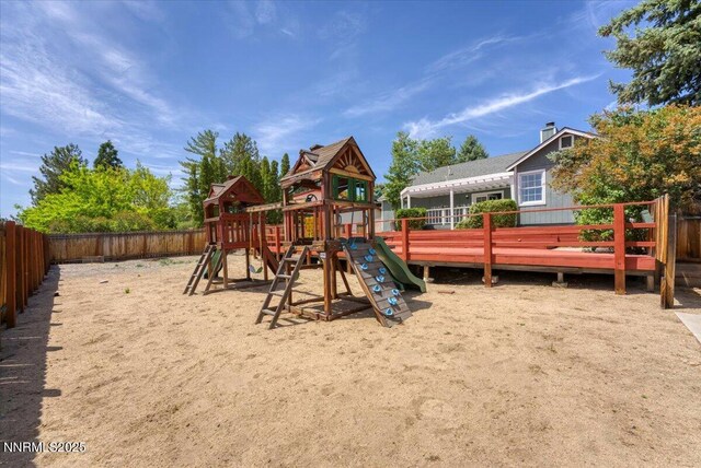 3277 Dartmouth Ct, Carson City, NV 89703 - view of playground featuring a fenced backyard and a wooden deck