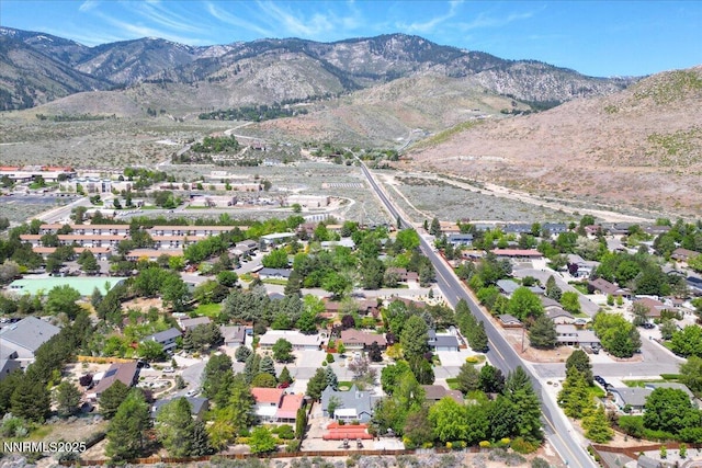 3277 Dartmouth Ct, Carson City, NV 89703 - aerial view of property and surrounding area featuring a mountainous background and nearby suburban area