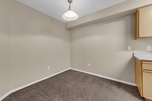 6850 Sharlands Ave Unit H2044, Reno, NV 89523 - unfurnished dining area featuring dark colored carpet and baseboards