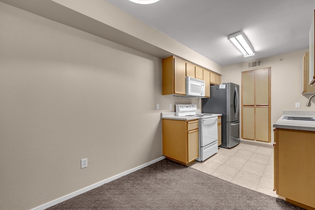6850 Sharlands Ave Unit H2044, Reno, NV 89523 - kitchen featuring white appliances, light carpet, a sink, and light countertops