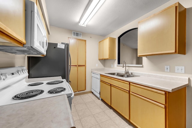 6850 Sharlands Ave Unit H2044, Reno, NV 89523 - kitchen with a sink, white appliances, light countertops, and a textured ceiling