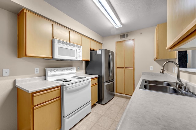 6850 Sharlands Ave Unit H2044, Reno, NV 89523 - kitchen featuring white appliances, a sink, a textured ceiling, light countertops, and light floors