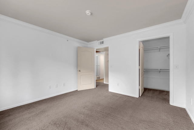 6850 Sharlands Ave Unit H2044, Reno, NV 89523 - unfurnished bedroom with ornamental molding, carpet flooring, baseboards, and a walk in closet