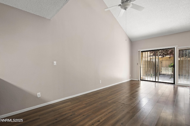 8670 Dixon Ln, Reno, NV 89511 - empty room with a textured ceiling, dark wood-type flooring, baseboards, high vaulted ceiling, and ceiling fan