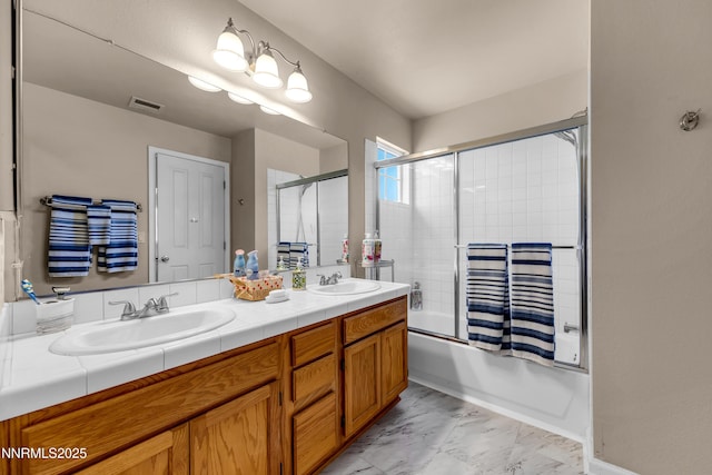 1635 Black Oak Rd, Sparks, NV 89436 - bathroom featuring double vanity, shower / bath combination with glass door, and marble finish flooring
