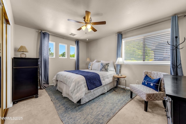 1635 Black Oak Rd, Sparks, NV 89436 - carpeted bedroom featuring multiple windows and ceiling fan