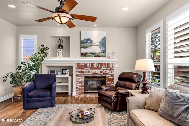 1635 Black Oak Rd, Sparks, NV 89436 - living room with wood finished floors, recessed lighting, a ceiling fan, a fireplace, and baseboards