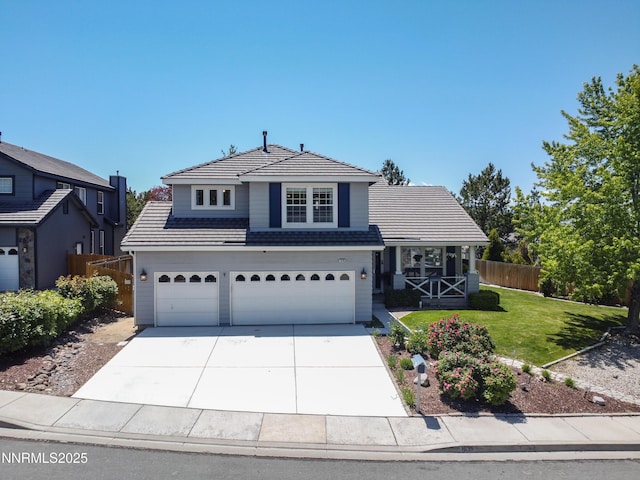 1635 Black Oak Rd, Sparks, NV 89436 - traditional-style home featuring a garage, a tiled roof, driveway, and covered porch