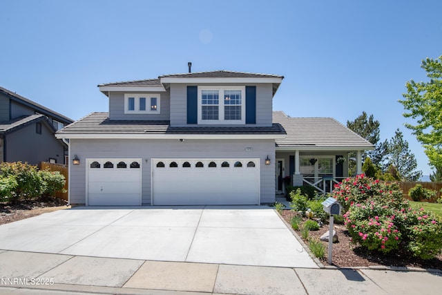 1635 Black Oak Rd, Sparks, NV 89436 - traditional-style home featuring an attached garage, a porch, driveway, and a tiled roof