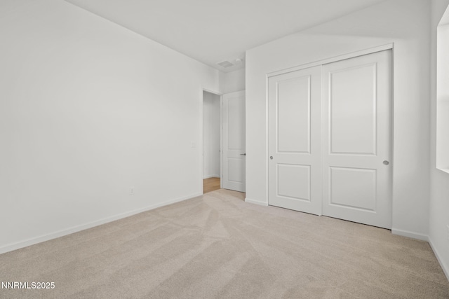 15025 Iron River Dr, Reno, NV 89521 - unfurnished bedroom featuring carpet, a closet, and baseboards