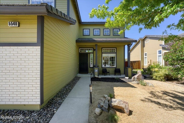 5540 Twin Creeks Dr, Reno, NV 89523 - property entrance featuring covered porch