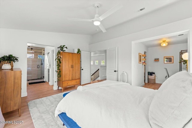 5540 Twin Creeks Dr, Reno, NV 89523 - bedroom with light wood-style floors, baseboards, ceiling fan, and connected bathroom
