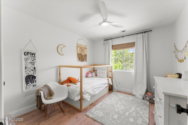 5540 Twin Creeks Dr, Reno, NV 89523 - bedroom with light wood-style flooring, baseboards, and ceiling fan
