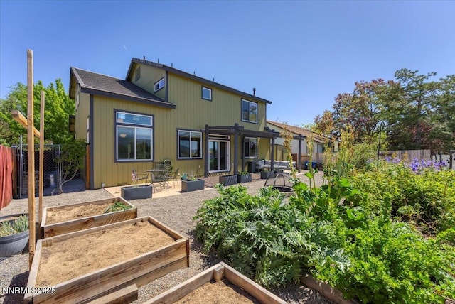 5540 Twin Creeks Dr, Reno, NV 89523 - rear view of property with a garden, a patio, a fenced backyard, and a pergola