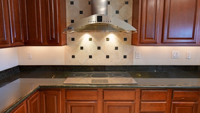 200 W 2nd St Apt 707, Reno, NV 89501 - kitchen with range hood, electric stovetop, and backsplash