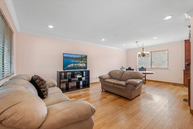410 Pheasant Dr, Fallon, NV 89406 - living area with a chandelier, baseboards, light wood-type flooring, crown molding, and recessed lighting
