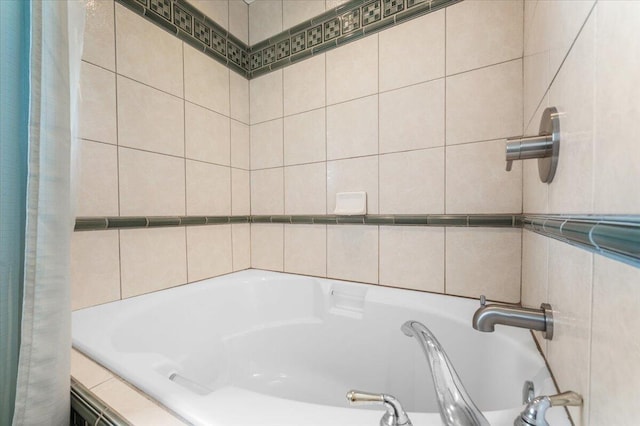 410 Pheasant Dr, Fallon, NV 89406 - bathroom featuring a bathtub and tile walls