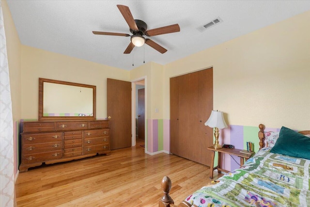 410 Pheasant Dr, Fallon, NV 89406 - bedroom with wood finished floors, ceiling fan, and a closet