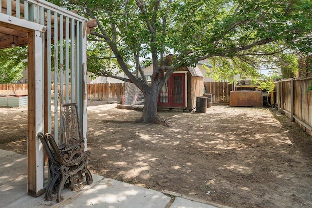 410 Pheasant Dr, Fallon, NV 89406 - fenced backyard with an outdoor structure
