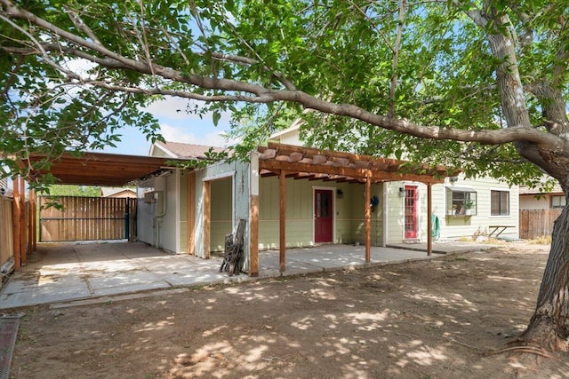 410 Pheasant Dr, Fallon, NV 89406 - rear view of property featuring a gate and a carport