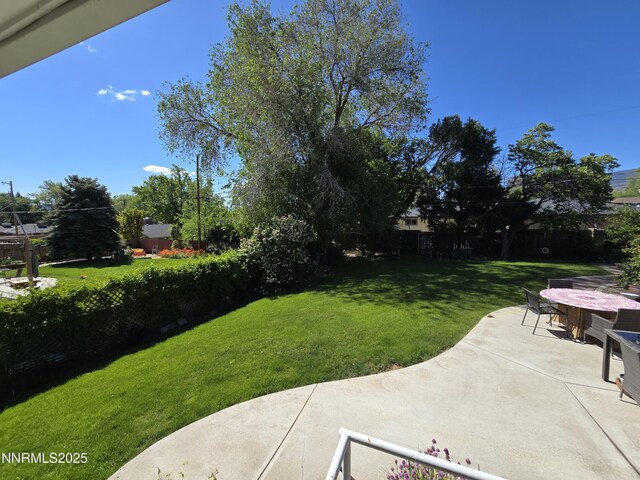 1290 Westwood Dr, Reno, NV 89509 - view of green lawn featuring a patio area and outdoor dining area