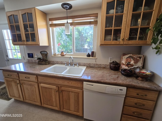 1290 Westwood Dr, Reno, NV 89509 - kitchen with dishwasher, a sink, light tile patterned floors, glass insert cabinets, and pendant lighting