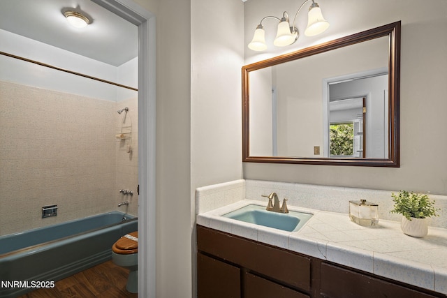 2770 Solari Dr, Reno, NV 89509 - full bath with toilet, vanity,  shower combination, and wood finished floors