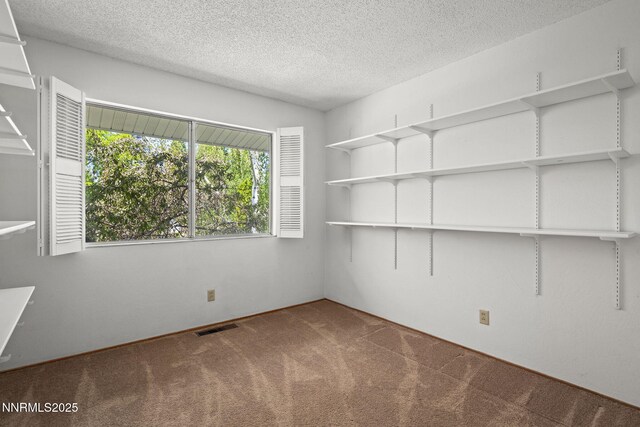 2770 Solari Dr, Reno, NV 89509 - carpeted spare room with a textured ceiling