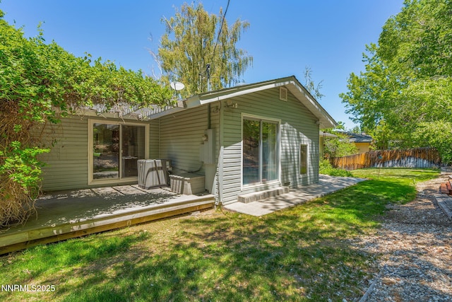 2770 Solari Dr, Reno, NV 89509 - rear view of property with a wooden deck