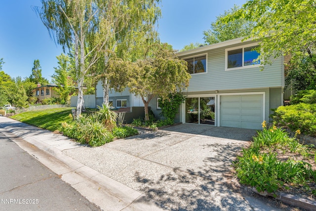 2770 Solari Dr, Reno, NV 89509 - view of front of house with driveway and an attached garage