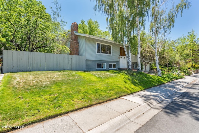 2770 Solari Dr, Reno, NV 89509 - bi-level home featuring a chimney