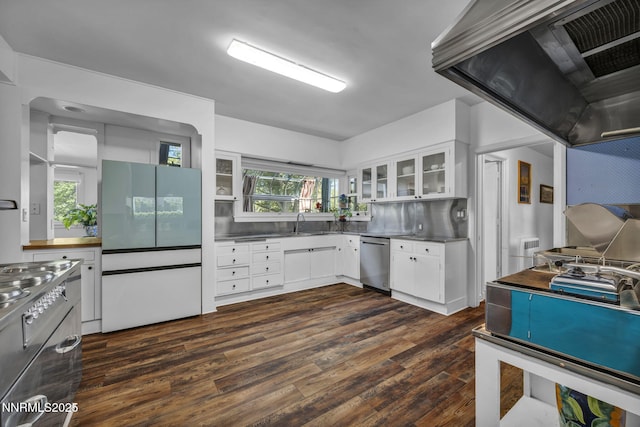 125 Greenridge Dr, Reno, NV 89509 - kitchen with dishwasher, stainless steel countertops, freestanding refrigerator, wall chimney exhaust hood, and dark wood-type flooring