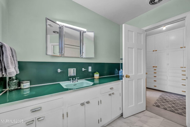 125 Greenridge Dr, Reno, NV 89509 - bathroom featuring marble finish flooring and vanity