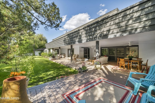 125 Greenridge Dr, Reno, NV 89509 - deck with a lawn and outdoor dining area