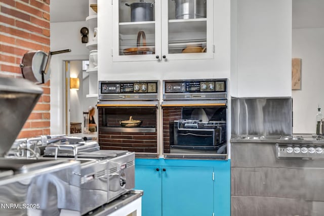 125 Greenridge Dr, Reno, NV 89509 - kitchen featuring oven and glass insert cabinets