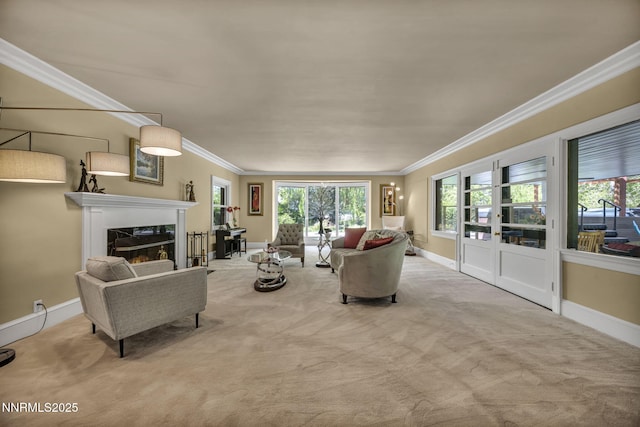 125 Greenridge Dr, Reno, NV 89509 - living area with crown molding, baseboards, carpet floors, healthy amount of natural light, and a fireplace