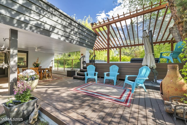 125 Greenridge Dr, Reno, NV 89509 - wooden deck featuring an outdoor hot tub, a ceiling fan, and outdoor dining space
