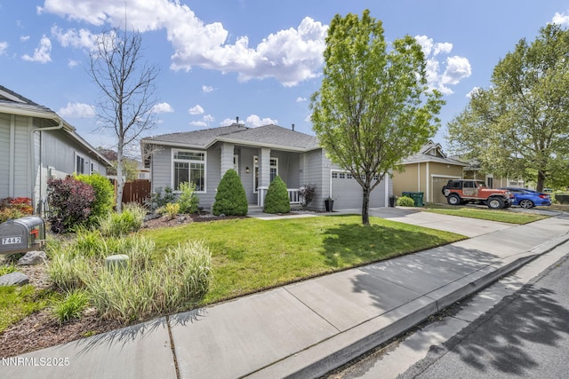 7442 Celeste Dr, Reno, NV 89511 - view of front of property with concrete driveway and an attached garage