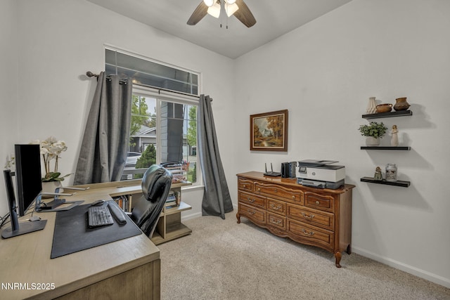 7442 Celeste Dr, Reno, NV 89511 - home office with a ceiling fan, baseboards, and light carpet
