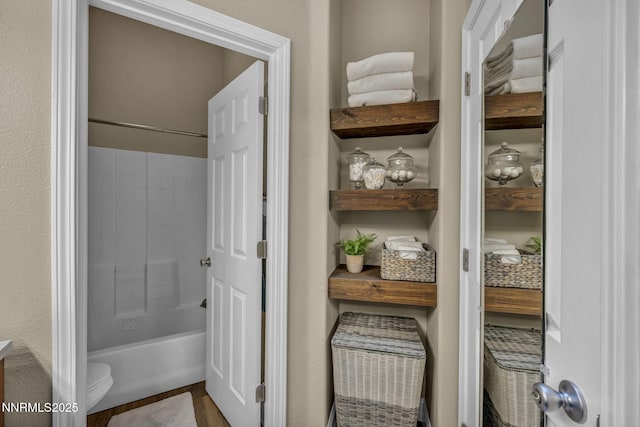 7442 Celeste Dr, Reno, NV 89511 - full bath with toilet, shower / washtub combination, and wood finished floors