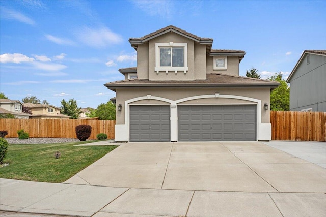 5625 Spandrell Cir, Sparks, NV 89436 - traditional-style home featuring stucco siding, an attached garage, and driveway