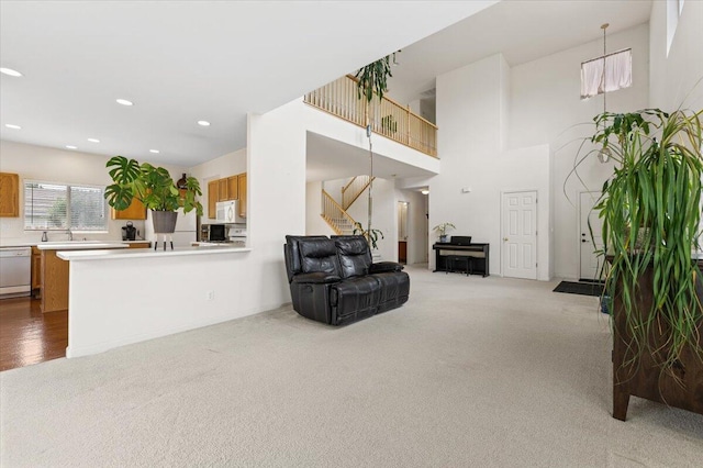 5625 Spandrell Cir, Sparks, NV 89436 - carpeted living room featuring stairs and recessed lighting