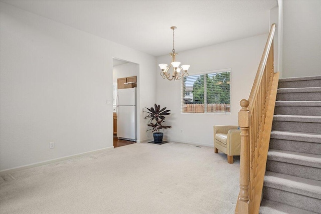 5625 Spandrell Cir, Sparks, NV 89436 - stairs with a chandelier, carpet floors, and baseboards