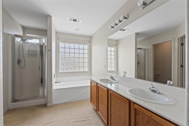 5625 Spandrell Cir, Sparks, NV 89436 - bathroom with a stall shower, a garden tub, and double vanity