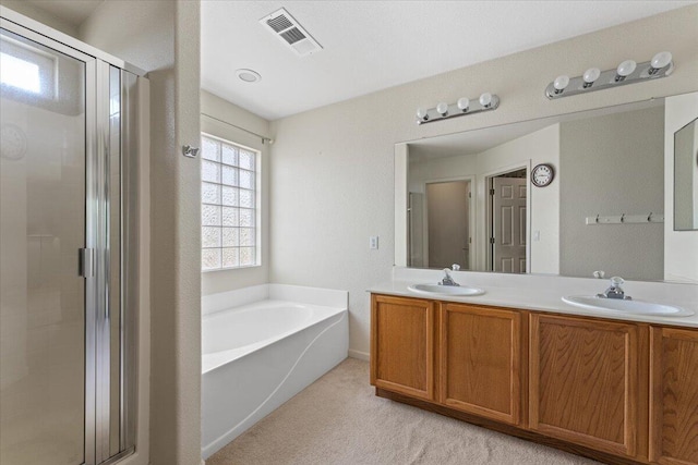 5625 Spandrell Cir, Sparks, NV 89436 - bathroom featuring a garden tub, a stall shower, and double vanity