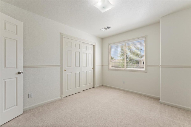 5625 Spandrell Cir, Sparks, NV 89436 - unfurnished bedroom with carpet flooring, baseboards, and a closet