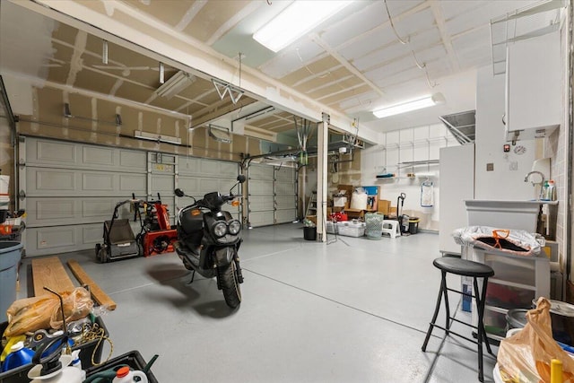 5625 Spandrell Cir, Sparks, NV 89436 - garage featuring freestanding refrigerator