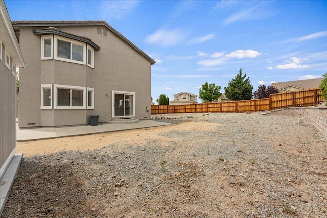 5625 Spandrell Cir, Sparks, NV 89436 - rear view of property featuring a patio, stucco siding, and a fenced backyard