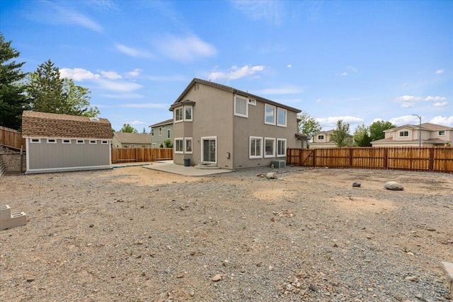 5625 Spandrell Cir, Sparks, NV 89436 - rear view of property featuring a patio area, a fenced backyard, central air condition unit, and stucco siding