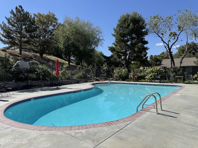 3951 Clear Acre Ln Unit 293, Reno, NV 89512 - community pool with a patio area